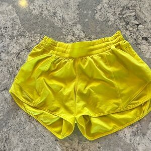 HIGHLIGHTER YELLOW LULULEMON HOTTY HOT 4” SHORTS